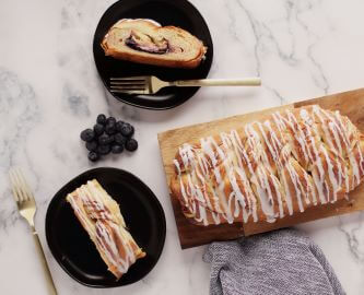 Butter Braid Pastry Blueberry Cream Cheese pastry with slices on plates