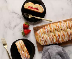 Butter Braid Pastry Strawberry Cream Cheese pastry with slices on plates